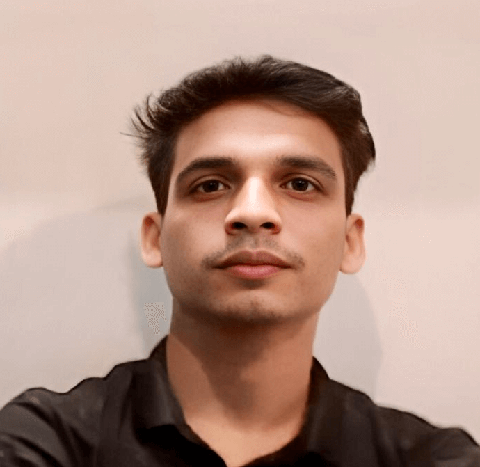 Image of an South Asian boy with black hair and brown eyes.